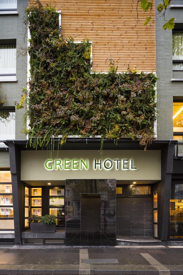 Green Hotel Genk Bagian luar foto